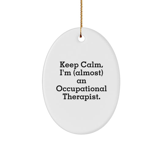 Funny Occupational Therapist Gifts for Christmas - 'Keep Calm, I'm (almost) An Occupational Therapist.' Oval Ornament - Image 1
