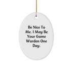 Funny Game Warden Gifts for Men - Christmas Unique Decorations with 'Be Nice To Me. I May Be Your Game Warden One Day.' Oval Ornament from Friends
