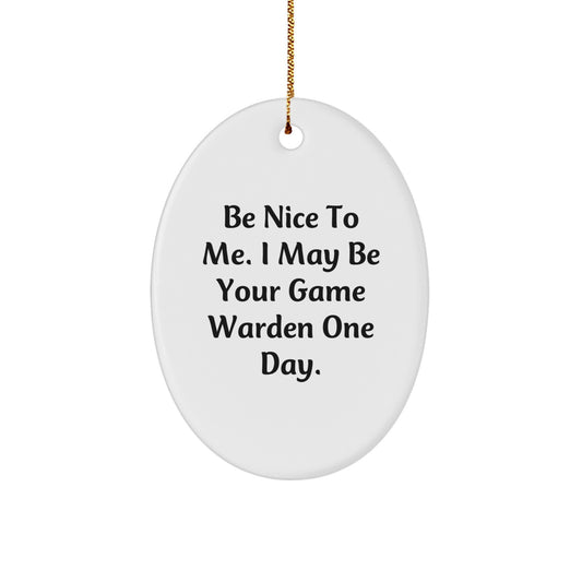 Funny Game Warden Gifts for Men - Christmas Unique Decorations with 'Be Nice To Me. I May Be Your Game Warden One Day.' Oval Ornament from Friends - Image 1