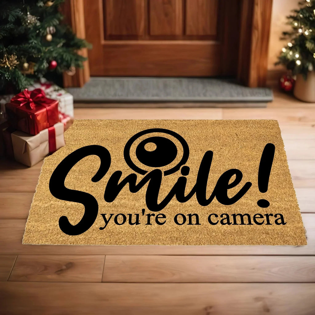 Funny Security Doormat - Smile! You’re on Camera | Coir Welcome Mat for Home Surveillance | Humorous Front Porch Décor